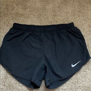 Black Nike running shorts
